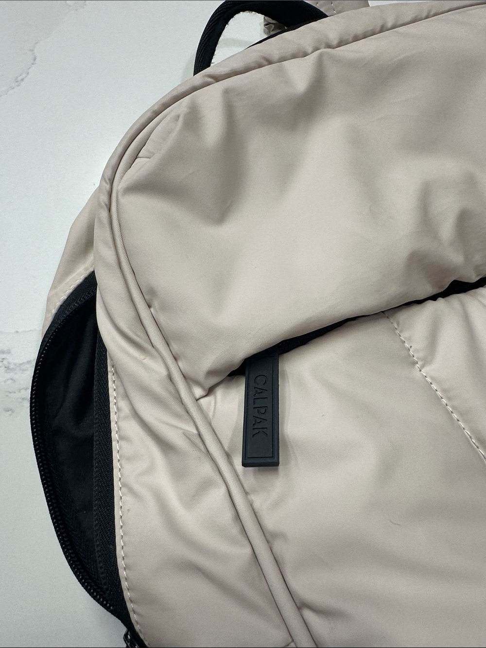 Calpak Light Beige Padded Backpack with Black Accents. Travel Backpack - Picture 2 of 11